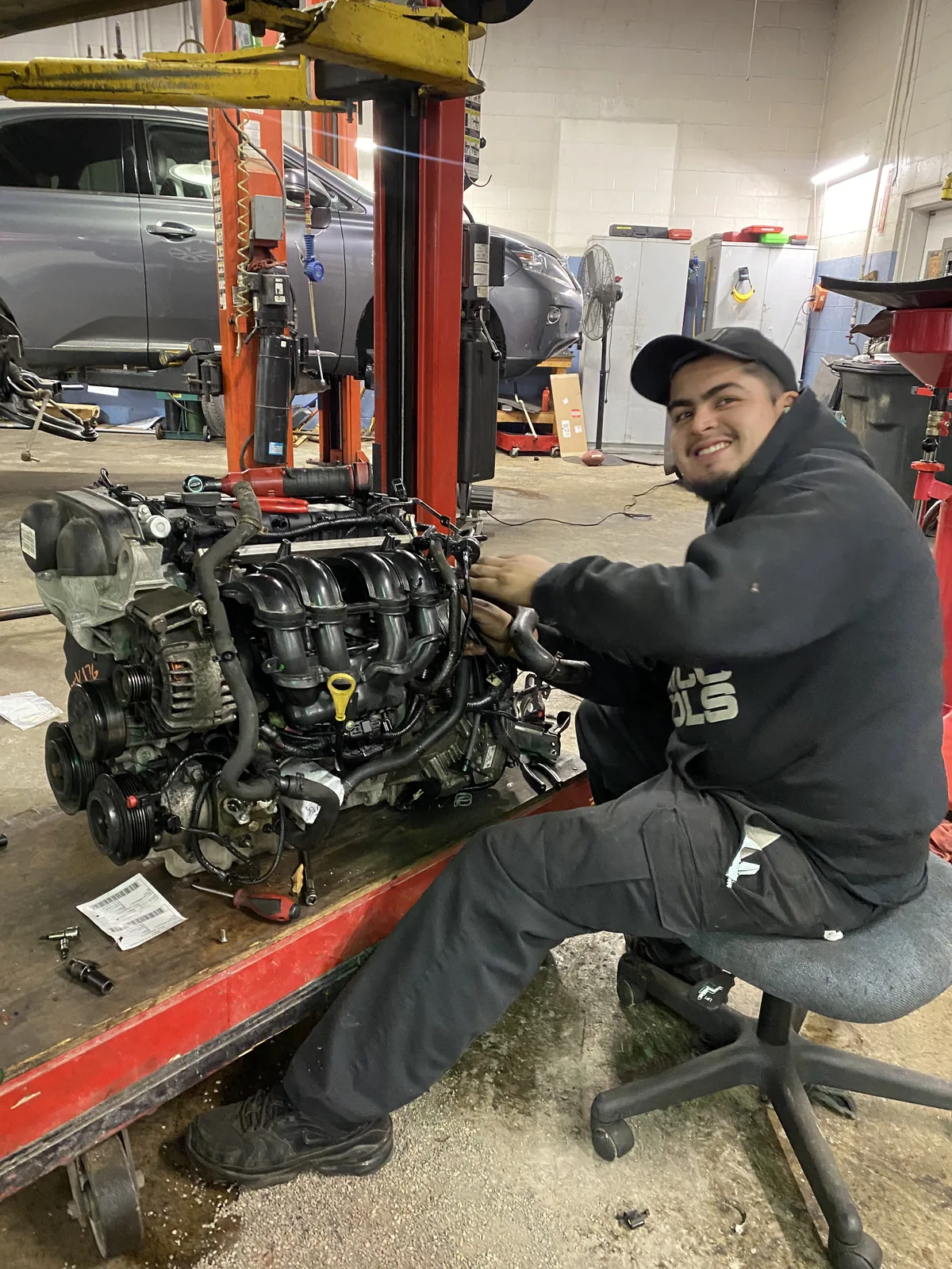 Technician rebuilding engine at Mint Hill Automotive
